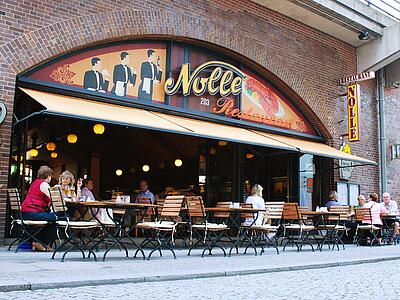 Aussenansicht des Restaurants Nolle in den S-Bahnbögen Aussenansicht des Restaurants Nolle in den S-Bahnbögen